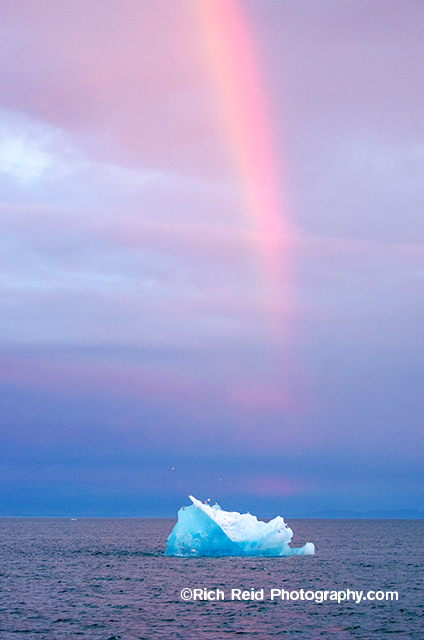 Blue glacial ice and rainbow in Stephens Passage in Southeast Alaska.
